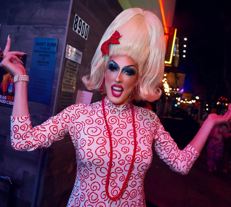 Dynamic portrait of a stylish individual showcasing bold fashion and vibrant colors.